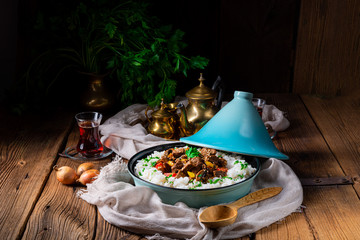 Tajin beef stew with rice paprika and sesame seeds