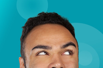 Cropped image of young African man with emotional face