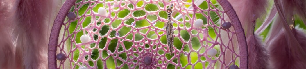 Banner of Handmade dream catcher with feathers threads and beads rope hanging