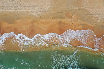 Fototapeta premium Sandy beach with sea top view