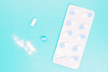 white capsules close up, pills capsules with white powder inside close up, coated medicine, medical preparations, drugs, pills in pack