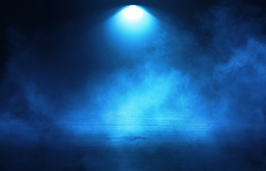 Empty background scene. Dark street reflection on wet asphalt. Rays of neon light in the dark, neon figures, smoke. Background of empty stage show. Abstract dark background.