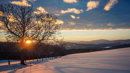 Beautiful and colorful sunrise in the mountains of the saxonian Erzgebirge in East Germany