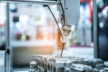 automation machine and detail close up in machine automatic with robotic automation technology for technology production factory