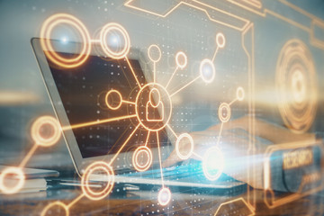 Social network theme hologram with businessman working on computer on background. Concept of world...