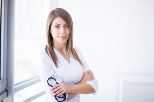 Medicine. Young female doctor in modern clinic