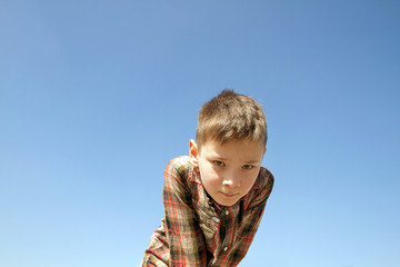 Happy boy play on square