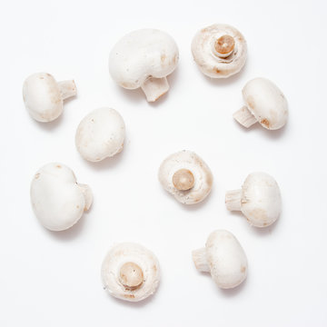 Champignons, close-up, isolated on white background. Top view.