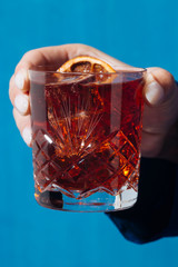 Negroni cocktail, with gin, bitter, vermut, in pop contemporary style, colorful and trendy