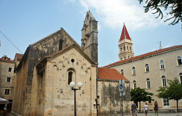 Fototapeta na wymiar The Church of St. Barbara and The Bell Tower of St. Lawrence Cathedral. beautiful architecture, sunny day, Trogir, Dalmatia, Croatia