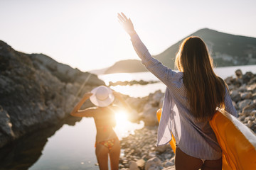 Sexy young beautiful girls having fun on the beach