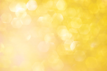 Blurred background - golden sparkles. Abstract image. Bright color. Abstract beautiful fasion bokeh.