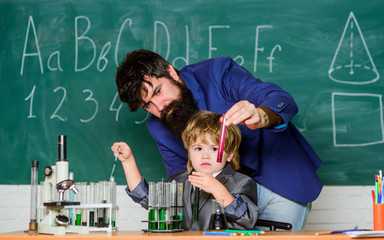 son and father at school. small boy with teacher man. Future dna technology. Back to school....
