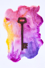 Abstract watercolor shape with old key