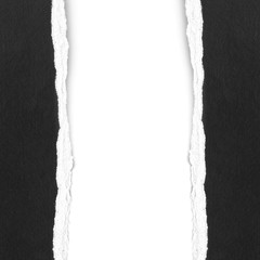 black ripped paper on white baclground, space for advertising copy