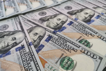 A pile of one hundred US dollars - Banknotes. Cash of hundred dollar bills , dollar background with high resolution