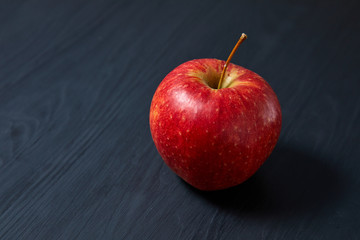 fresh apple on the black background