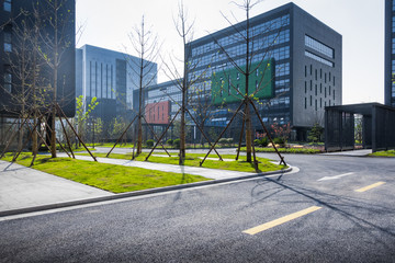 city road through modern buildings in beijing