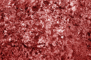 Old stone surface in red tone.