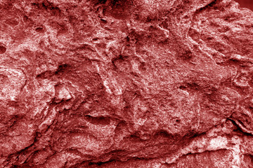 Old stone surface in red tone.