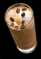 Closeup Iced Coffee Isolated on Black Background. - 275249674