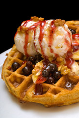 Gofre - belgian homemade waffles with ice cream, bananas and nuts