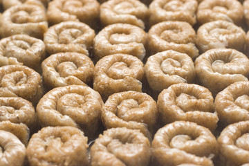 Pieces of Turkish or arabic traditional declious oriental dessert pahlava, baklava.