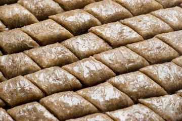 Pieces of Turkish or arabic traditional declious oriental dessert pahlava, baklava.