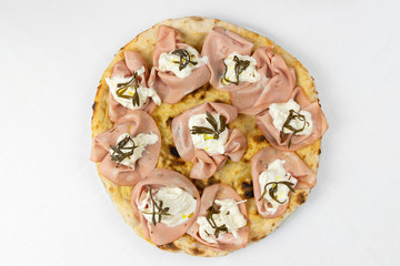 Gourmet pizza with mortadella, mozzarella and rosemary. top view