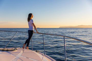 Fototapeta premium happy woman on the yacht