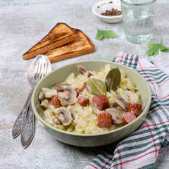 Stewed vegetables with sausages