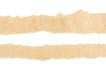 Two torn pieces of brown cardboard on white background. Cardboard stripes for advertising text.