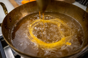 Close up homemade Dessert made from egg yolks or Thai desserts. (Selective focus)