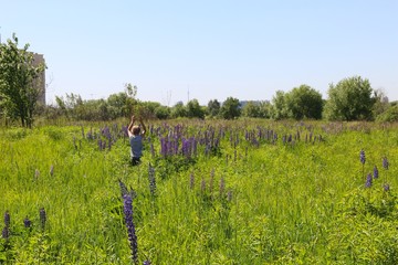 Boy running through the flower field