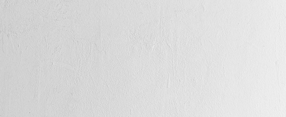 close up clean plain white color cement wall panoramic background texture for show or advertise or...