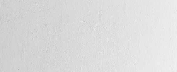 Obraz premium close up clean plain white color cement wall panoramic background texture for show or advertise or promote product and content on display and web design element concept 