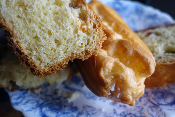Pieces of cake on plate with blur effect.