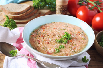 Stracciatella tomato soup: parsley, eggs and parmesan cheese