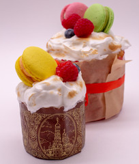 Easter cake decorated with macaroons and berries