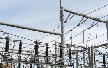 High voltage power transformer substation. Distribution electric substation with power lines and...