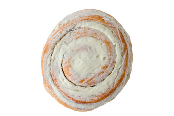 isolated on white background baked round snail bun cinnamon with cream close-up top view