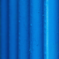 Many old blue pipes. Pipeline used in different industry ways: gas, water or vapor supply. Close up