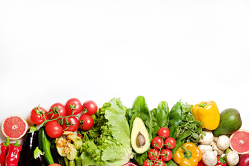 Clean healthy eating habits concept. Fruits, herbs, greens & vegetables mix, colorful juicy organic detox smoothie juice ingredients, white background. Vegan vegetarian diet food. Flat lay, copy space