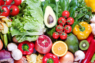 Clean healthy eating habits concept. Fruits, herbs, berries & vegetables mix, colorful juicy organic detox smoothie juice ingredients background. Vegan vegetarian diet food. Flat lay, copy space.