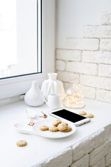 Flat lay top view arrangement with empty screen smartphone and home decor
