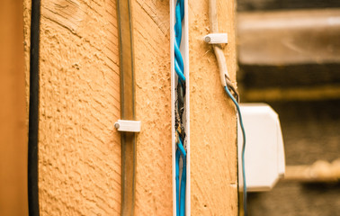 Short circuit, burnt cable on wooden construction. fire wiring. faulty cable