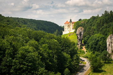 Castle on the hill in Ojcow National Park Poland - Pieskowa Skala, Hercules's mace rock - obrazy, fototapety, plakaty