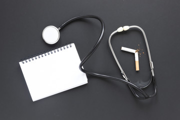 Top view notebook and stethoscope