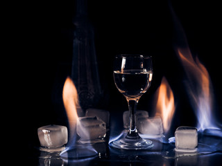 Fire on the wine glass, fire on the cocktail glass , vodka ice and fire