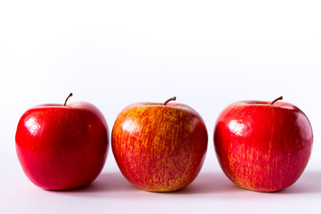 red apples on white background art